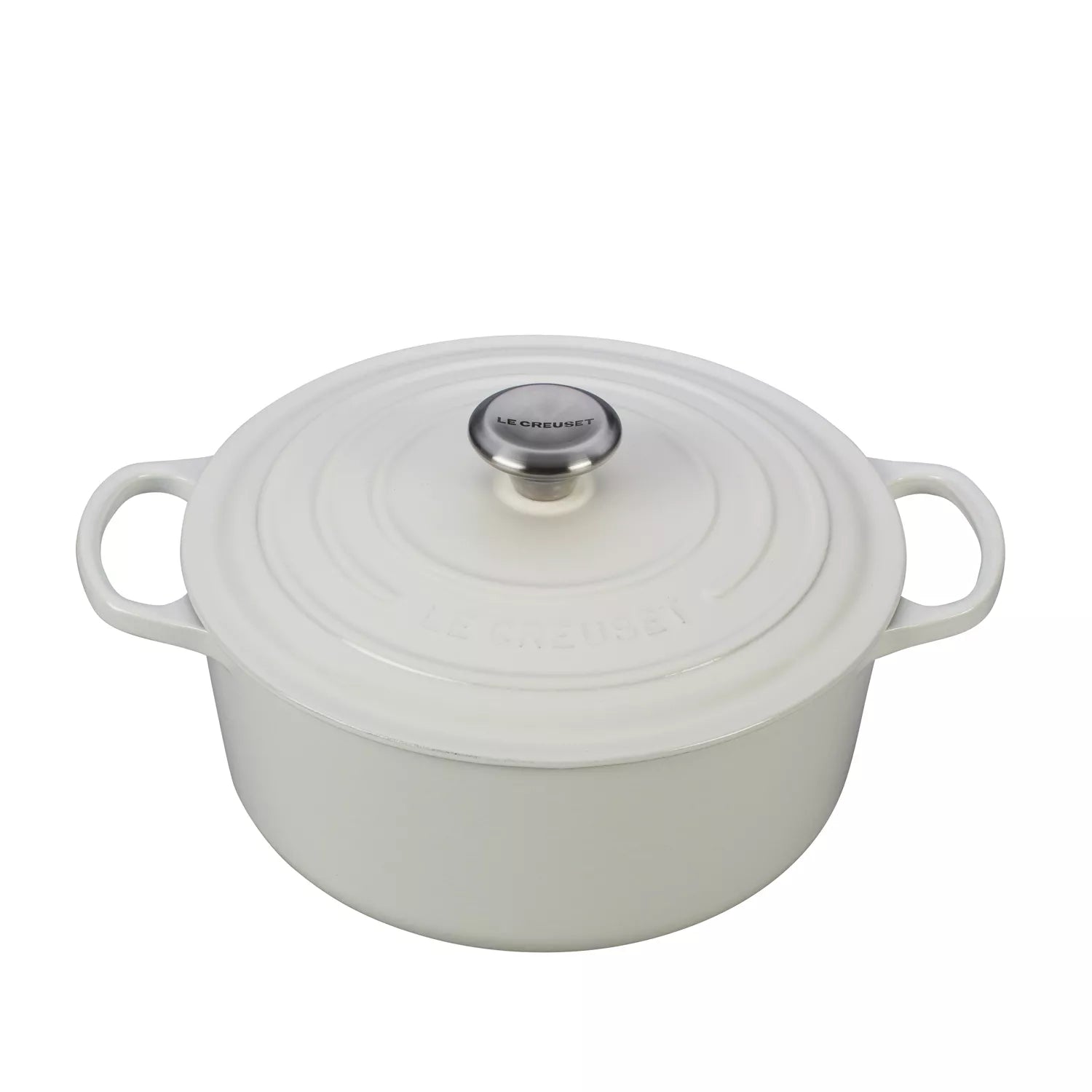 White enameled cast iron Dutch oven with a lid on a white background
