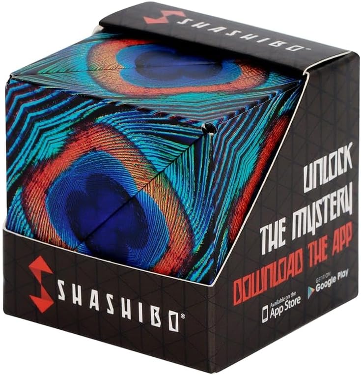 Shashibo puzzle cube with peacock feather pattern in packaging